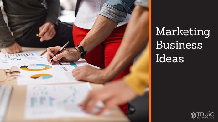 A group of entrepreneurs standing around talking.